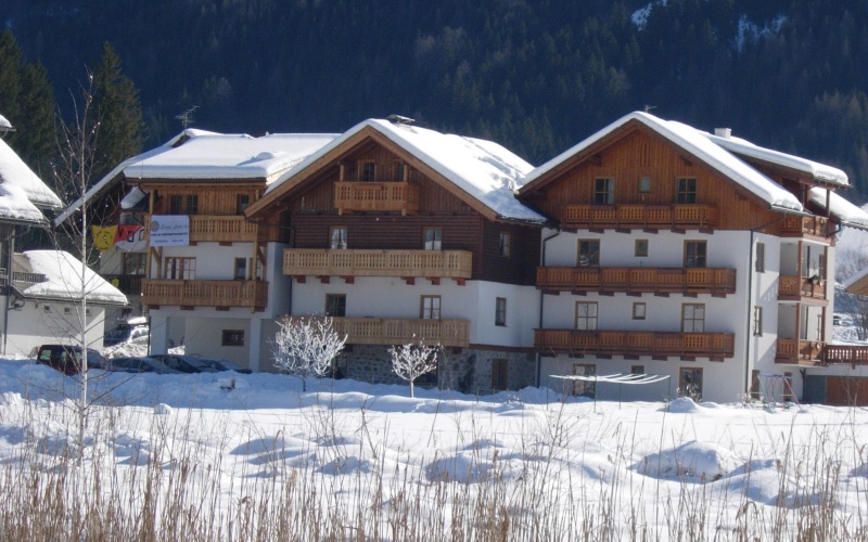 Haus Heimat im Winter - Zimmer und Ferienwohnungen am Weissensee in Kärnten