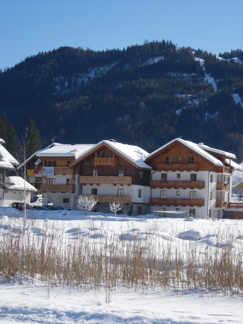 Haus Heimat im Winter - Zimmer und Ferienwohnungen am Weissensee in Kärnten