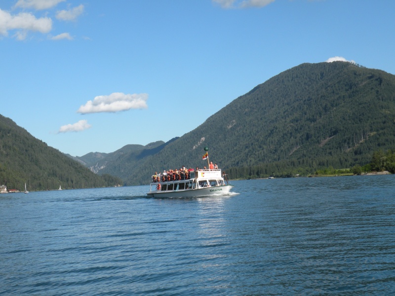 Experience a boat cruise at lake Weissensee